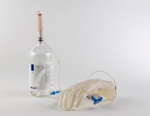 Untitled (Ghost Hand), Medical Ephemera and Resin, Dimensions Variable, 2015